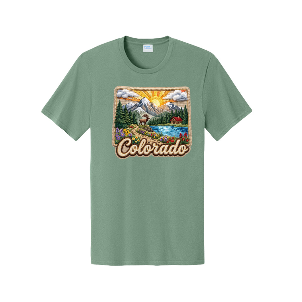 A sage green short-sleeve t-shirt with a colorful 'Colorado' landscape graphic on the chest, displayed against a solid white background.
