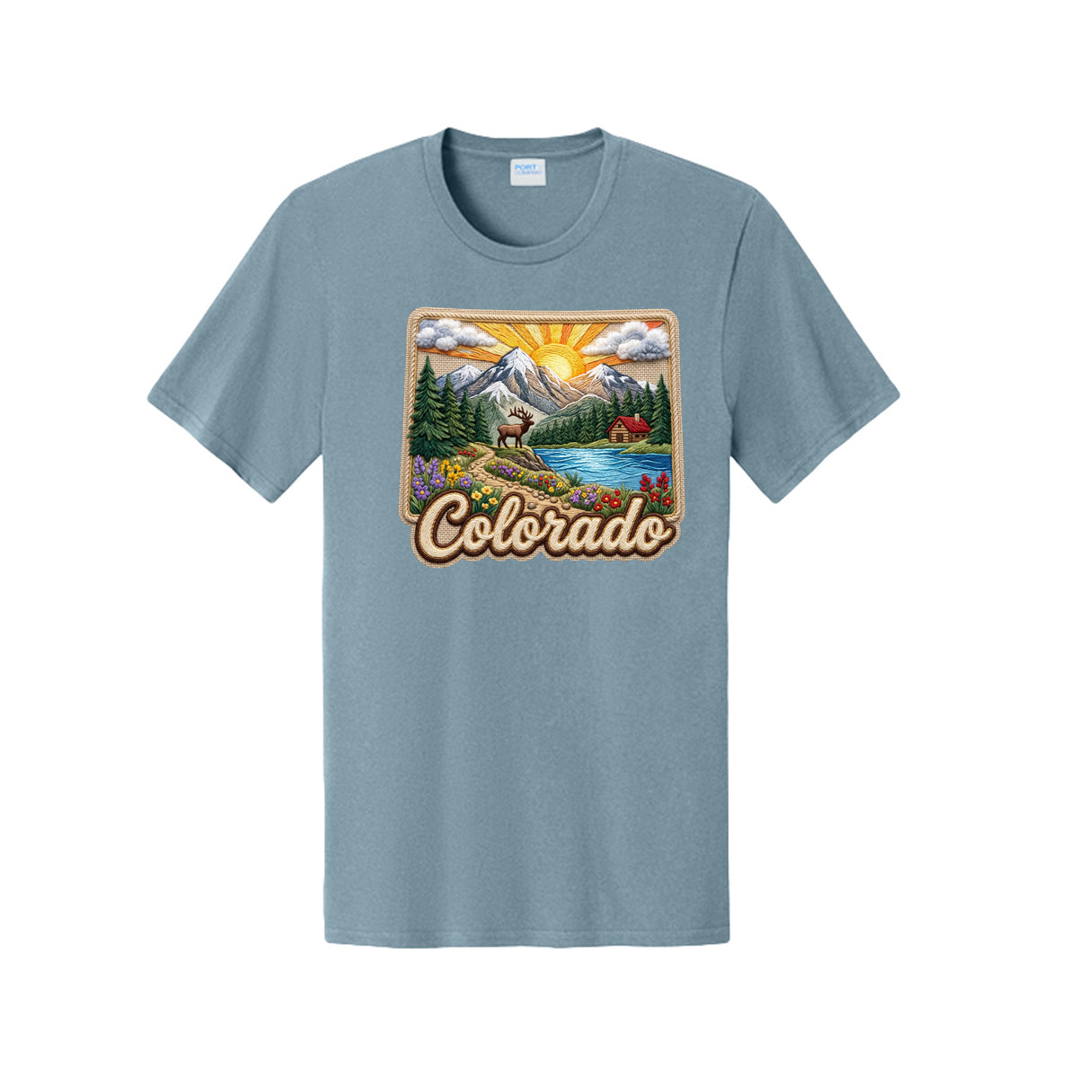 A heathered slate blue short-sleeve t-shirt with a colorful graphic print on the chest depicting a scenic Colorado landscape with mountains, a lake, and the word 'Colorado' in retro-style lettering.